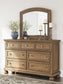 Vandenmore Queen Storage Sleigh Bed with Mirrored Dresser and Nightstand
