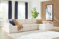 Ashley Express - Fannin 4-Piece Sectional with Ottoman